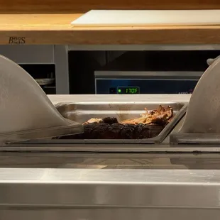 The pork is in the tray back there.
