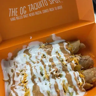 Corn tortilla taquitos (shredded beef, chicken and cheese) fully loaded w/lit sauce