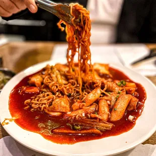 Tteokbokki with ramen. Spicy and delicious!! One of my favorite dishes to get here.