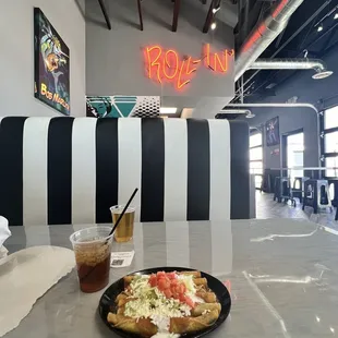 6 flautas, Sweet Tea, and a Chuco Beer! Love the feel of this place!