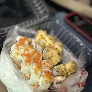 Roll 7: Crab Mix, Spicy Tuna, Shrimp Tempura, Avocado Masago &amp; Roll 9
