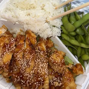 Bento box: Sesame Chicken with white rice and edamame