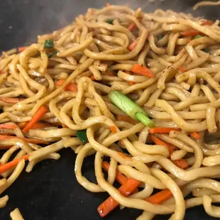 Freshly sauteed lo mein noodles.