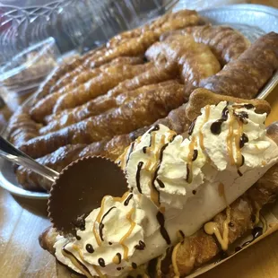 Donuts and coffee (Flavor: Layla | coffee) featured on Friday&apos;s when we are able to source the glazed croissants!