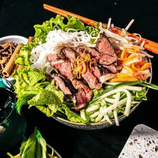 a bowl of beef salad