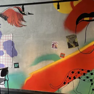 a colorful mural on the wall