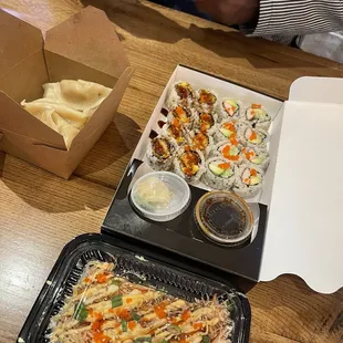a man eating a meal with chopsticks