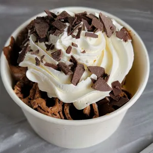 a cup of ice cream and chocolate