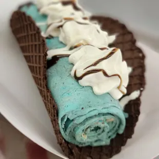 a chocolate and blue ice cream roll
