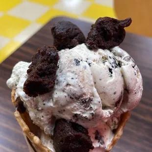 Salted Sea Salt Caramel Cookies and Cream Scooped Ice Cream in a waffle cone
