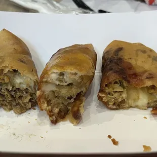 From left to right - Philly cheesesteak, chicken parm, chicken cheesesteak