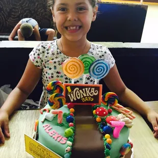 Birthday girl wanted to cut her cake and eat pizza at Rollerama