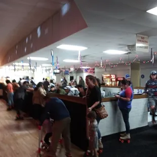 Heres where you hop on to the skating rink.