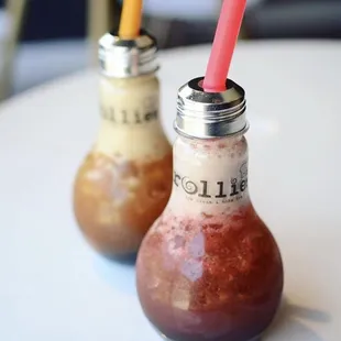 a close up of two bottles of coffee