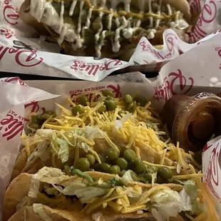 Both 3 Nanas Tacos and the Sonoran Dog.