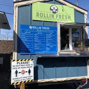  man standing in front of a food truck