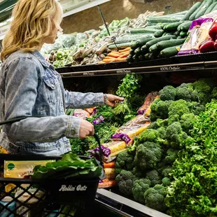  woman shopping for vegetables