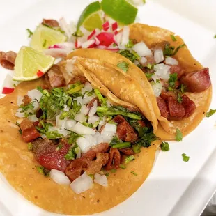 wo tacos on a white plate