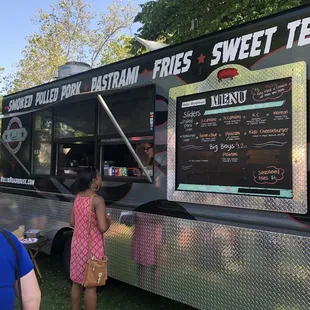 a woman ordering a sweet tea