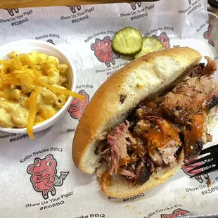 pulled pork sandwich with macaroni and cheese