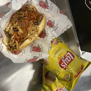 Pulled Pork Sandwich and chips