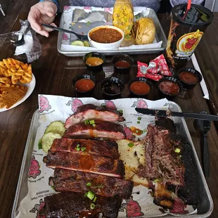 Ribs platter, waffle fries, baked beans, mac n cheese wrap.