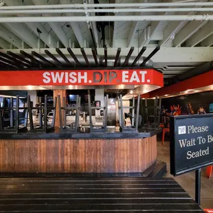 the entrance to a restaurant