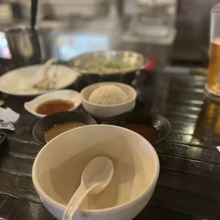 a bowl of soup with a spoon in it