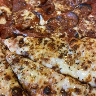 Plain Cheese and double pepperoni pizza- their Cheese pizza is 10/10!