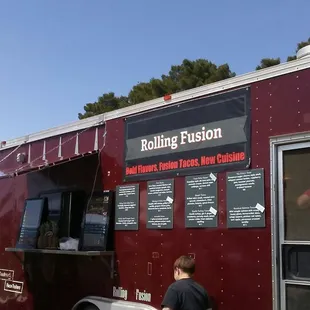 a food truck parked in a parking lot