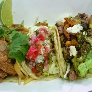 Tai fried chicken, avocado, and marinated steak taco.