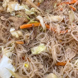 a mixture of noodles and meat