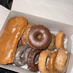 a variety of doughnuts in a box