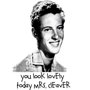a black and white photo of a smiling man