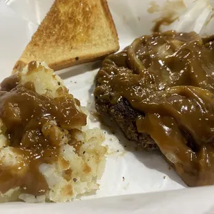 Hamburger steak with mashed potatoes.