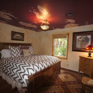 Luxurious bedding in rustically appointed bedrooms, comfortably sleeps 15.