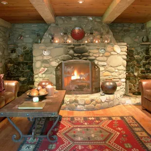 Entertain in our cozy living room featuring indoor koi ponds