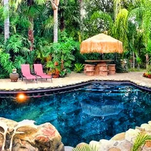 Relax by our beautiful lagoon and two spas