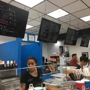 a woman behind the counter