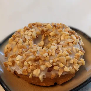 a donut covered in nuts