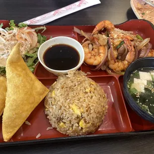 Bento box with teriyaki shrimp.