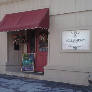 the entrance to roll's meats