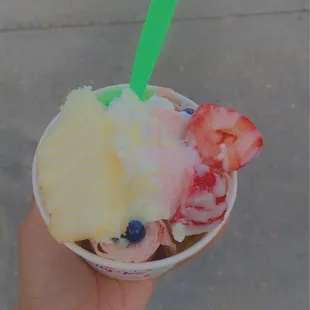 Berry Gentilly roll ice cream, topped with strawberries, blueberries,condensed milk, piece of cake and whipped cream !