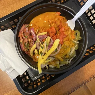 Rice, spicy chicken, mango medley, pickled onions, tikka masala sauce