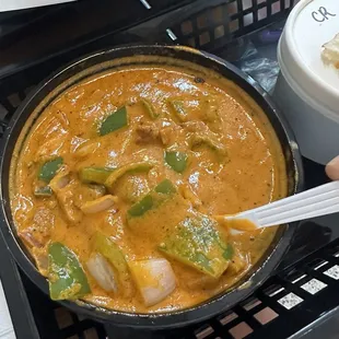 Tikka Masala Chicken with mostly bell peppers and onions (maybe 3 small cubes of chicken)