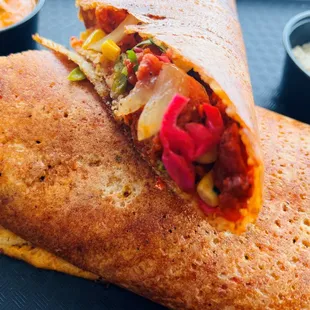 a close up of a burrito