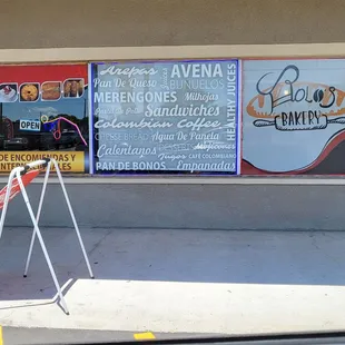 a closed sign in front of a store