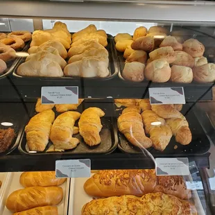 Lovely case of pan de bono, pan de yuca, croissants, churro rings, and much more