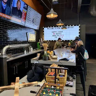 My wife sitting at the bar.