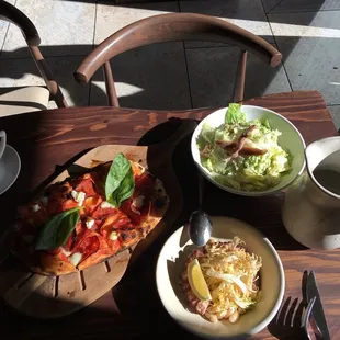 Pizza, ceasar salad, octopus